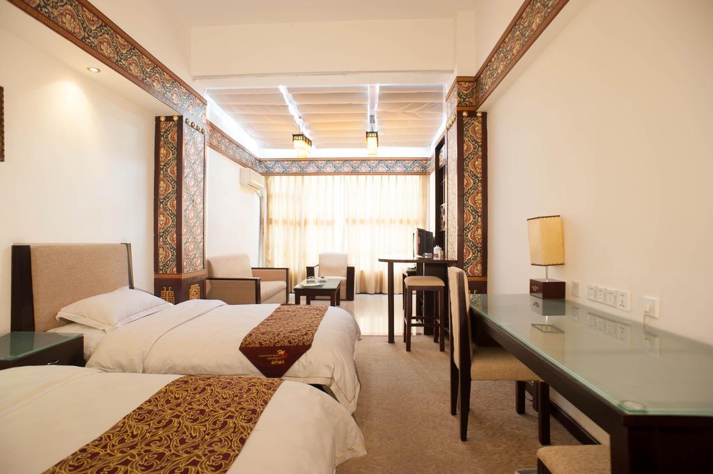 Jiuzhaigou Jinzhulinka Resort Hotel Цзючжайґоу Номер фото